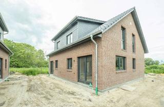 Doppelhaushälfte kaufen in 21629 Neu Wulmstorf, Ankommen und wohlfühlen – Moderne Doppelhaushälfte mit Garten in Feldrandlage