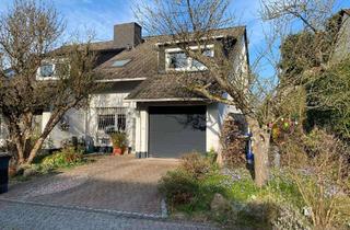 Haus kaufen in 61118 Bad Vilbel, Ruhiger Wohntraum in Bestlage am Waldrand von Bad Vilbel - großz. DHH mit Garage
