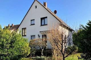 Einfamilienhaus kaufen in Lübecker Straße 10, 65428 Rüsselsheim, Berliner Viertel. Renovierungsbedürftiges Einfamilienhaus mit Doppelgarage und 567 m² Grundstück