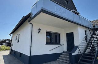 Haus kaufen in 76751 Jockgrim, Flexibles Wohnkonzept: Zweifamilienhaus mit vermieteter Einheit und viel Potenzial