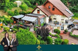 Einfamilienhaus kaufen in 66299 Friedrichsthal, Exklusives Einfamilienhaus mit Gartenparadies, Garage und Einliegerwohnung