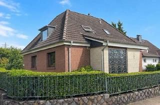 Einfamilienhaus kaufen in Süderende, 24790 Schacht-Audorf, Solides Einfamilienhaus mit Keller und Garage in zentraler Lage