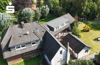 Grundstück zu kaufen in 26409 Wittmund, Für Investoren: Mehrparteienhaus mit Ausbaupotential