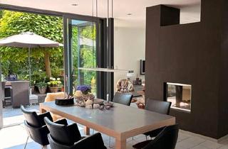 Einfamilienhaus kaufen in 49134 Wallenhorst, Wallenhorst - Außergewöhnliche Architektur trifft auf Traumlage am Nettetal