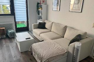 Wohnung kaufen in 28816 Stuhr, Stuhr - Charmante 2-Zimmer-Dachgeschosswohnung mit Stellplatz in Stuhr