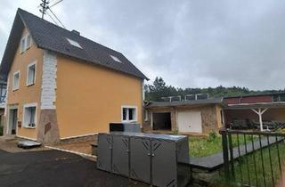 Haus kaufen in 56237 Nauort, Nauort - Haus mit Einliegerwohnung und 2 Hallen