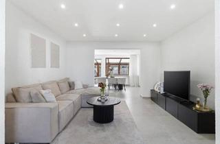 Doppelhaushälfte kaufen in 52499 Baesweiler, Baesweiler - Modernisierte Doppelhaushälfte mit Wintergarten, Garage & Garten