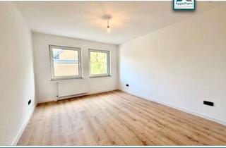 Wohnung kaufen in 49176 Hilter, Einziehen oder investieren: Hochwertige EG-Wohnung mit Terrasse