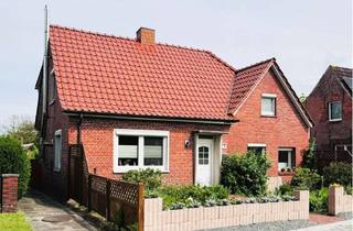 Haus kaufen in 26759 Hinte, Modernisiertes Wohlfühlhaus mit Garten, Garage, Doppelcarport und Werkstatt in ruhiger Warftenlage