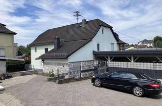 Einfamilienhaus kaufen in 56244 Maxsain, Freistehendes Einfamilienhaus mit Innenhof und Carport in zentraler Lage von Maxsain