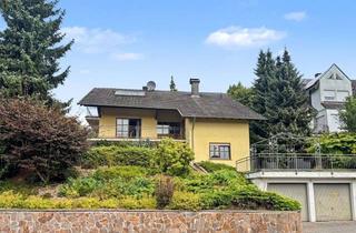 Einfamilienhaus kaufen in 63776 Mömbris, Vermietetes Einfamilienhaus mit Einliegerwohnung in begehrter Hanglage von Mömbris