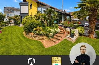 Einfamilienhaus kaufen in 68642 Bürstadt, Stilvolles Einfamilienhaus mit Wintergarten, Kamin & mediterranem Garten