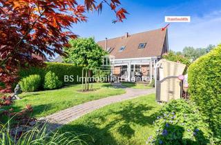 Doppelhaushälfte kaufen in 26723 Larrelt, Constantia-West! Doppelhaushälfte mit Carport, überdachter Terrasse und Gartenanlage in ruhiger Lag
