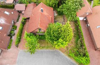 Einfamilienhaus kaufen in 26524 Lütetsburg, Einfamilienhaus mit Holzcharakter in ruhiger Sackgassenlage nahe Golfplatz