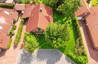 Einfamilienhaus kaufen in 26524 Lütetsburg, Einfamilienhaus mit Holzcharakter in ruhiger Sackgassenlage nahe Golfplatz