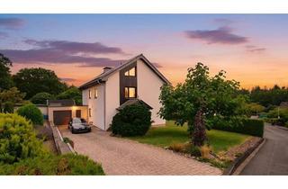 Einfamilienhaus kaufen in 32791 Lage, gepflegtes und großzügiges Einfamilienhaus mit großem Garten und Bauland in ruhiger Lage in Lage