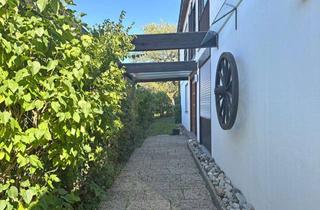 Einfamilienhaus kaufen in 73087 Bad Boll, Wohnglück im Grünen: Einfamilienhaus mit idyllischem Garten und zwei Terrassen