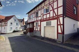 Einfamilienhaus kaufen in 34311 Naumburg, Naumburg - Charmantes Einfamilienhaus mit viel Platz und mit Garage im Haus