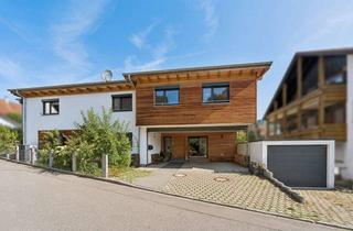 Haus kaufen in 79686 Hasel, Exklusives Architektenhaus mit drei Wohneinheiten und Garten.