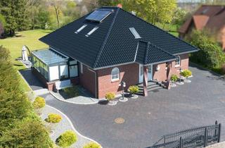 Haus kaufen in 24647 Wasbek, Stilvolles Familienhaus mit Wellnessbereich