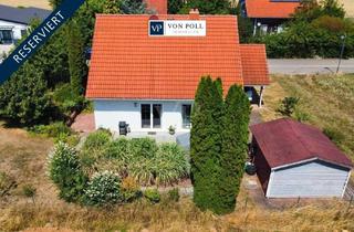 Einfamilienhaus kaufen in 97215 Simmershofen, Naturidylle für die Familie: Lichtdurchflutetes Einfamilienhaus mit schönem Garten, Kamin & Terrasse