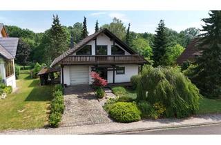 Einfamilienhaus kaufen in 55595 Winterbach, Charmantes Einfamilienhaus mit großem Garten, Kachelofen und vielseitigen Nutzungsmöglichkeiten