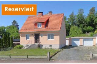 Einfamilienhaus kaufen in 37290 Meißner, Wohnen auf einer Ebene – Gemütliches Einfamilienhaus mit Garagen und großem Grundstück