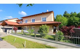 Haus kaufen in 93083 Obertraubling, Außergewöhnliches Wohnhaus mit privatem Wellnessbereich und Indoor-Pool