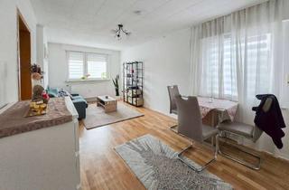 Haus kaufen in 65479 Raunheim, Wohnhaus mit drei Wohneinheiten und kleinem Ladenbereich in zentraler Lage von Raunheim