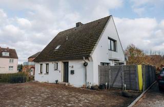 Einfamilienhaus kaufen in 23611 Bad Schwartau, Charmantes Einfamilienhaus mit zwei Terrassen und viel Gestaltungspotenzial in Bad Schwartau