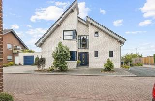 Einfamilienhaus kaufen in 41379 Brüggen, Freistehendes Einfamilienhaus in Feldrandlage – Lichtdurchflutetes Wohnen mit Garten & Doppelgarage