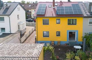 Anlageobjekt in 65428 Rüsselsheim, Vielseitiges Mehrfamilienhaus mit Garten in Rüsselsheim am Main