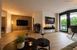 Wohnung kaufen in 51427 Bergisch Gladbach, Elegantes Wohnambiente mit großzügigem Balkon und modernem Design