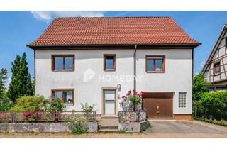 Haus kaufen in 72411 Bodelshausen, Charmantes Zweifamilienhaus mit großem Grundstück und Dachausbaupotenzial