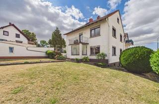 Haus kaufen in 55270 Sörgenloch, Ein Zuhause zum Gestalten – mit Garten, Weitblick und einem außergewöhnlichem Platzangebot