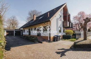 Wohnung kaufen in 79224 Umkirch, Eigentumswohnung im Charakter einer Doppelhaushälfte mit Garten in Umkirch