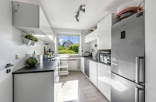 Wohnung kaufen in 45527 Hattingen, Modernisierte Erdgeschosswohnung mit offener Küche, Westbalkon und überdachtem Stellplatz