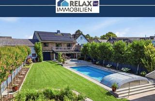 Einfamilienhaus kaufen in 52511 Geilenkirchen, Modernisiertes Einfamilienhaus mit Pool und Traumgarten in Geilenkirchen-Teveren