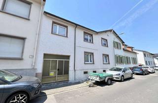 Haus kaufen in 63165 Mühlheim, Attraktives Zweifamilienhaus mit großem Garten in zentraler Lage nahe Bahnhof und Parkanlage