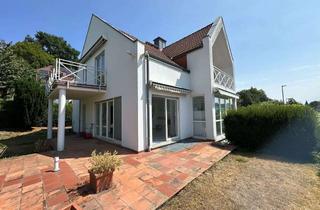 Haus kaufen in 65207 Kloppenheim, Ausgefallene Architektur die ewig inspiriert! Erstklassiges, FEH in ruhiger Randlage Wiesbaden!