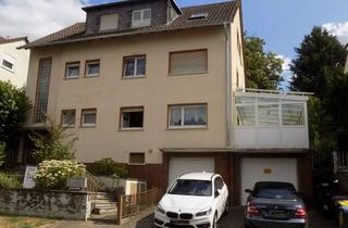Haus kaufen in 61118 Bad Vilbel, Dreifamilienhaus in Hanglage mit großen Garten, Bad Vilbel