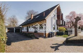 Wohnung kaufen in 79224 Umkirch, Eigentumswohnung im Charakter einer Doppelhaushälfte mit Garten in Umkirch