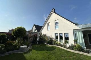 Haus kaufen in Kühnemannweg, 18209 Bad Doberan, Modernes Effizienzhaus 55 mit PV-Anlage, Speicher, Wallbox, Wintergarten und Doppelgarage