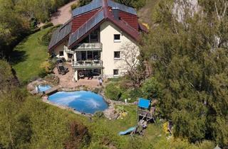 Einfamilienhaus kaufen in 98528 Suhl, Suhl - 350 m² Wohnkomfort mit Wärmepumpe, 30 kWp PV und separater Praxis