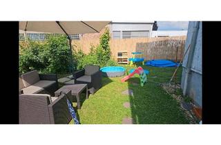 Wohnung kaufen in 61169 Friedberg, Friedberg (Hessen) - Eigentumswohnung mit eigenem Garten in Friedberg