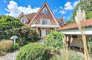Wohnung kaufen in 23627 Groß Grönau, Imposante Maisonette-Wohnung mit Einfamilienhaus-Charakter, 4 Balkonen, Doppelcarport u. Sauna!