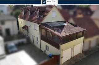 Einfamilienhaus kaufen in 97342 Seinsheim, Einfamilienhaus mit großzügigen Räumen und zwei Garagen