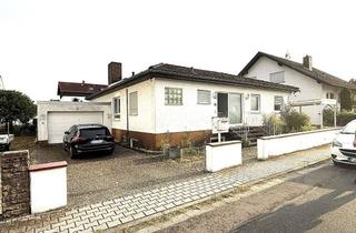 Haus kaufen in 64560 Riedstadt, Gepflegter Winkelbungalow mit Wintergarten, großer Garten, Garage und Carport