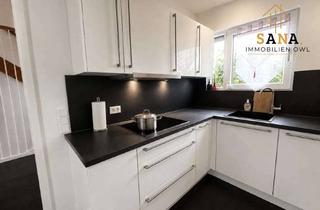 Einfamilienhaus kaufen in 32139 Spenge, Modernes Einfamilienhaus mit PV-Anlage, Wärmepumpe & traumhaftem Feldblick in Spenge