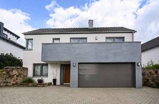 Einfamilienhaus kaufen in 34233 Fuldatal, Exklusives Einfamilienhaus mit besonderer Architektur in Fuldatal-Simmershausen!